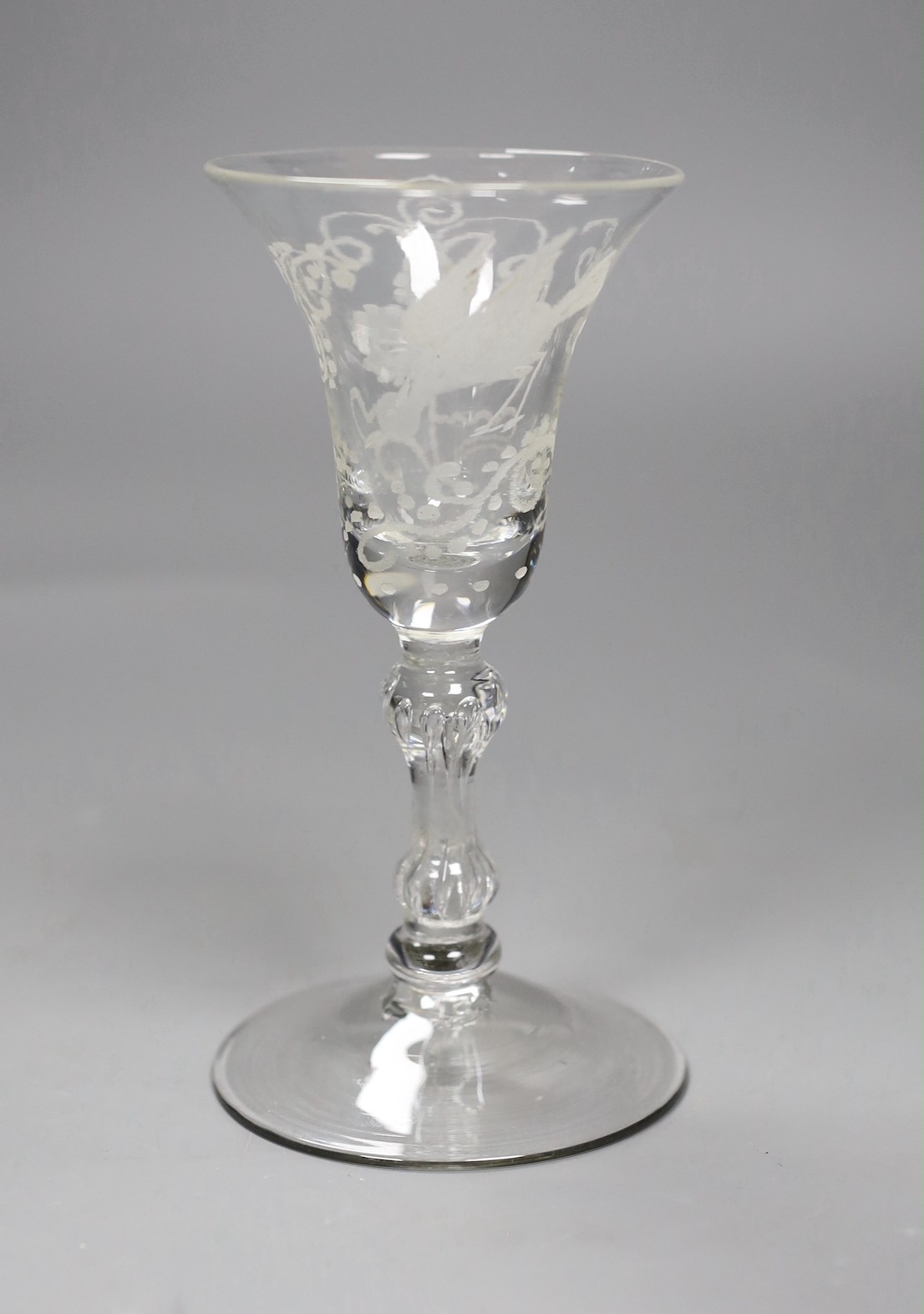 An 18th century wheel engraved balustrade fluted glass, 15cm tall